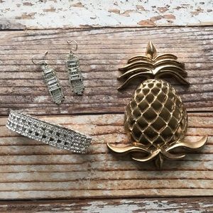 Rhinestone bracelet and earrings.